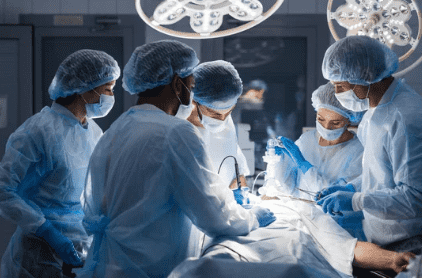 surgeons engaging in rescue of patient in operation room at hospital, emergency case